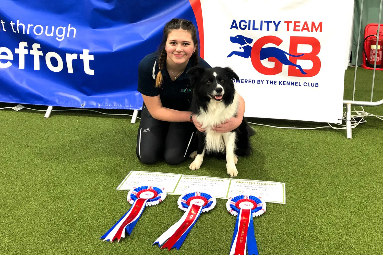 Yvie Thompson and her springer cross poodle Bella with their agility medals
